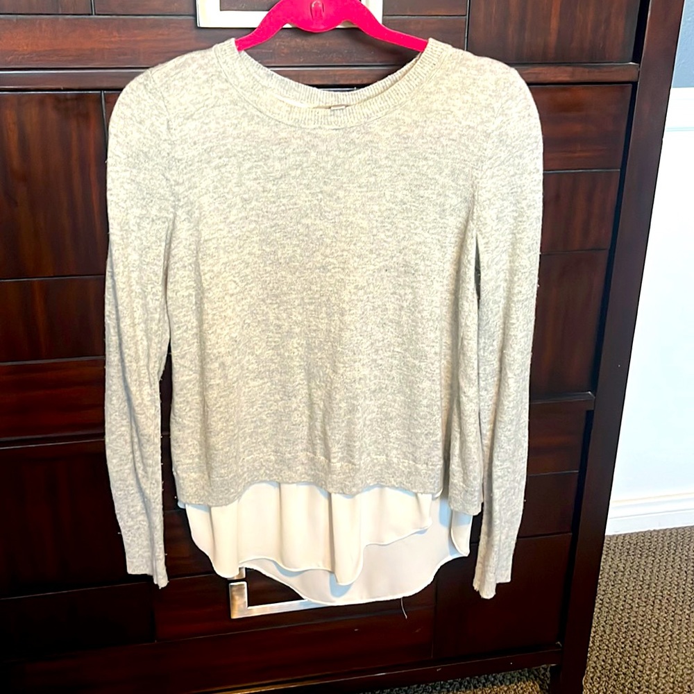 Grey sweater w/ivory linen at the bottom back has beautiful detail